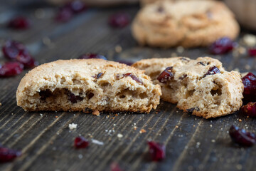 delicious dried cookies made of high-quality flour with dried red cranberries on the table