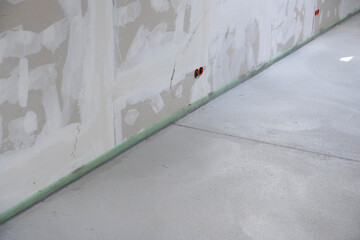 freshly cured concrete screed on construction site in loft in a family house
