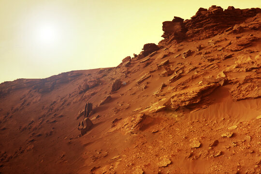 Surface of Mars, rocky terrain. Elements of this image furnished by NASA © Artsiom P