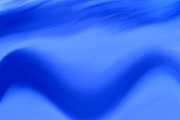 Abstract blue unfocused background. Blurred spots and lines. Background for the cover of a laptop, notebook.