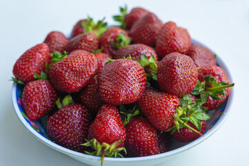 Red strawberry in the plate