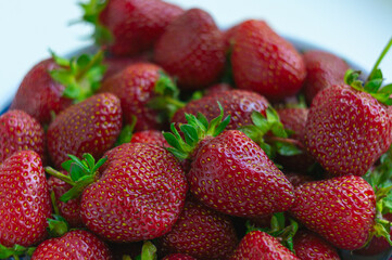 Red strawberry in the plate