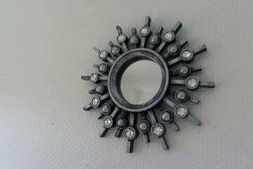 mirror with diamonds on a white