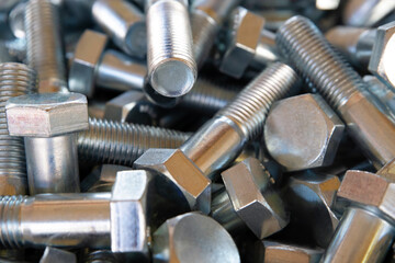 Close up of metall bolts background. Industrial abstract concept