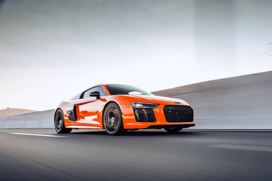 Seattle, WA, USA
March 1, 2022
Orange Audi R8 driving on the road