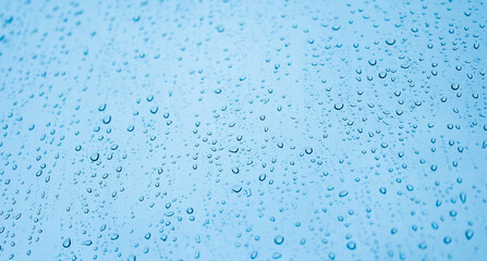Water drops on glass, selective focus, texture of drops on glass
