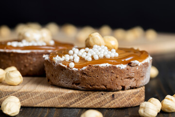 chocolate tartlet with cream filling and salted caramel with nuts