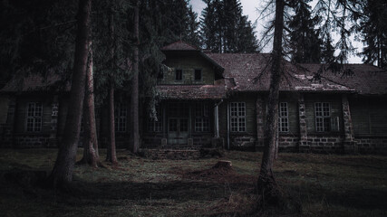 Fototapeta na wymiar Abandoned Wooden House With Scary Atmosphere