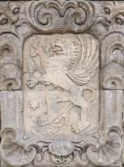 Medieval stone bas-relief with heraldic royal lion