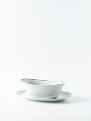 set of empty dishes on the table on a white background