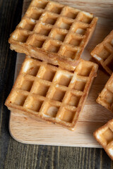 square sweet soft waffles on the table