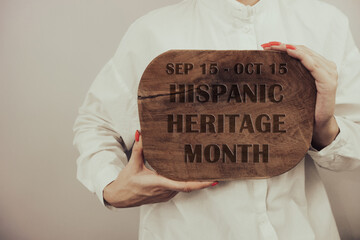 Hispanic Heritage Month date on vintage wooden board