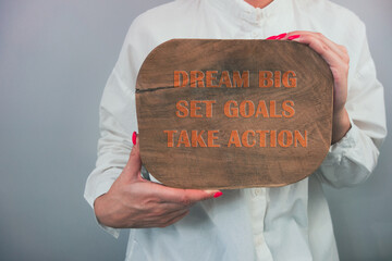 Dream big, set goals, take action motivational advice on wooden board. Inspiration and business success concept - Powered by Adobe