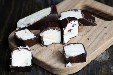 curd cheese in milk chocolate on the table