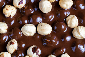 real milk chocolate while cooking with hazelnuts