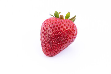 Single strawberry on white