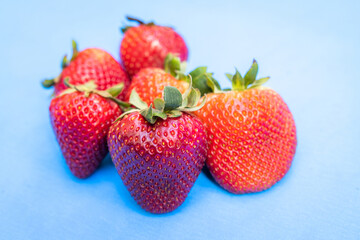 Strawberries on a blue background
