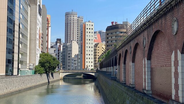 The bridge at Kanda river Ochanomizu &ldquo;Shoheibashi&rdquo;,  the old brick base of train tracks are turned into restaurants and shopping district, the long river of Kanda, year 2022 June 13th