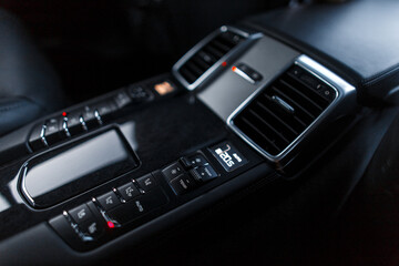 Interior of a modern automobile. The dashboard in a luxury sports car