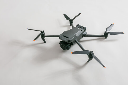 DJI Mavic 3 drone with high quality optics on gray background