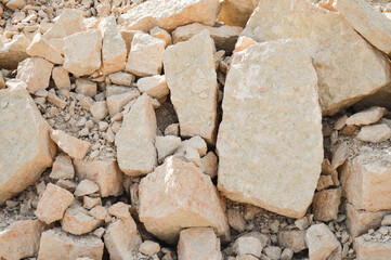 The texture of a pile of limestone stones