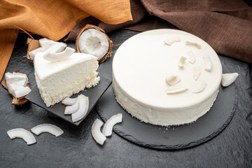 White cake with coconut cream.