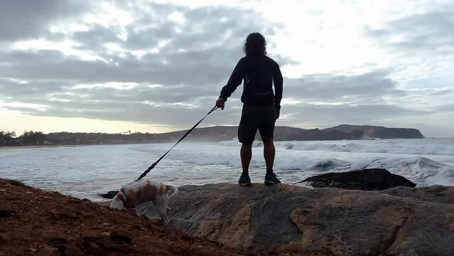 person walking on the beach