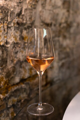 Tasting of brut champagne sparkling wine produced by traditional method in underground caves