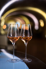 Tasting of brut champagne sparkling wine produced by traditional method in underground caves