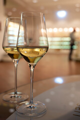 Tasting of brut champagne sparkling wine produced by traditional method in underground caves