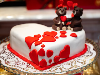Food styling in bakery, wedding or happy valentine cakes and candies decorated with chocolate hearts and flowers
