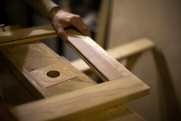 Carpenter makes wood. Board processing.