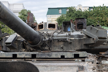 Fototapeta na wymiar Russian tank turret. Rusty russian tank burned by the Ukrainian military during Russian invasion of Ukraine, Kiev