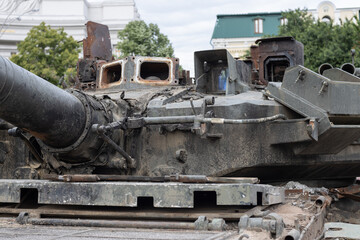 Fototapeta na wymiar Russian tank turret. Rusty russian tank burned by the Ukrainian military during Russian invasion of Ukraine, Kiev