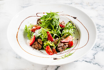 salad with strawberries and duck liver