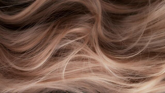 Super Slow Motion Shot of Waving Light Brown Highlighted Hair at 1000 fps.