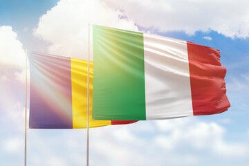 Sunny blue sky and flags of italy and romania - obrazy, fototapety, plakaty
