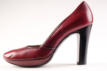 burgundy high heel shoes on white background isolated with empty space for text