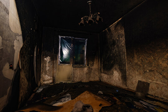 Burnt apartment house interior. Consequences of fire