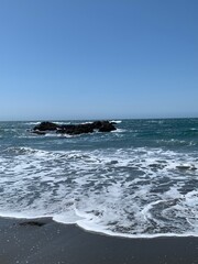 waves crashing on rocks