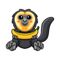 Cute little saki monkey cartoon holding banana