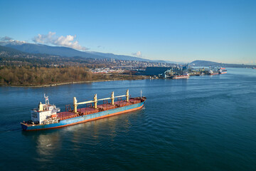 Freighter Entering Port of Vancouver. A freighter enters Burrard Inlet and the Port of Vancouver.

