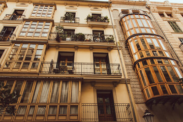 Old building facade, Palma de Mallorca, Spain. Old windows closeup of building in Spain. Facade of an ancient building