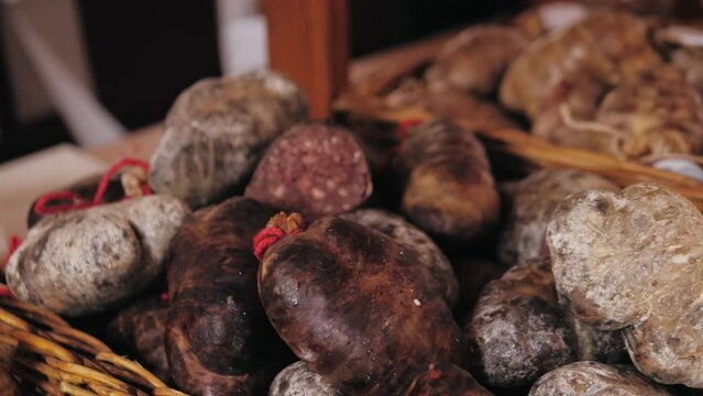 Homemade uncooked black blood spanish sausages on festival market, traditional food in spain