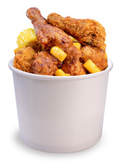 Delicious Korean fried chicken in paper bucket isolated on white background, Fried chicken and korean rice cake on white With clipping path.