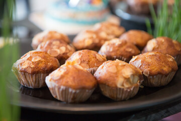Selective focus of Muffins in a tray on the buffet table.