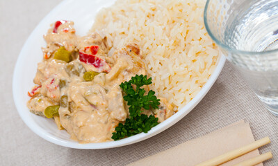 Chicken fillet red curry with jasmine rice. High quality photo