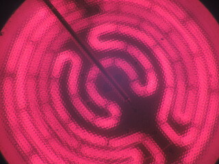 Electric heating plate glowing close up texture