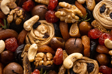 a mixture of dried fruits and nuts gathered together in a bouquet