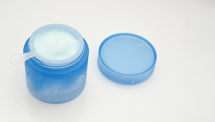 spoon scoop skin cosmetic cream from container